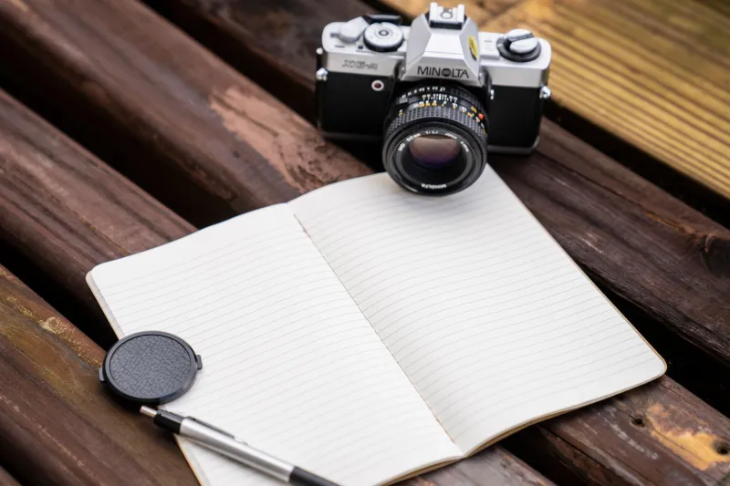 Slow Down to Speed Up: The Real Reasons People Are Reaching for Pens, Records, and Film Cameras Again